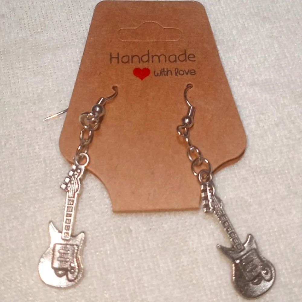Black and silverl guitar dangle earrings and silver-tone electric guitar pendant